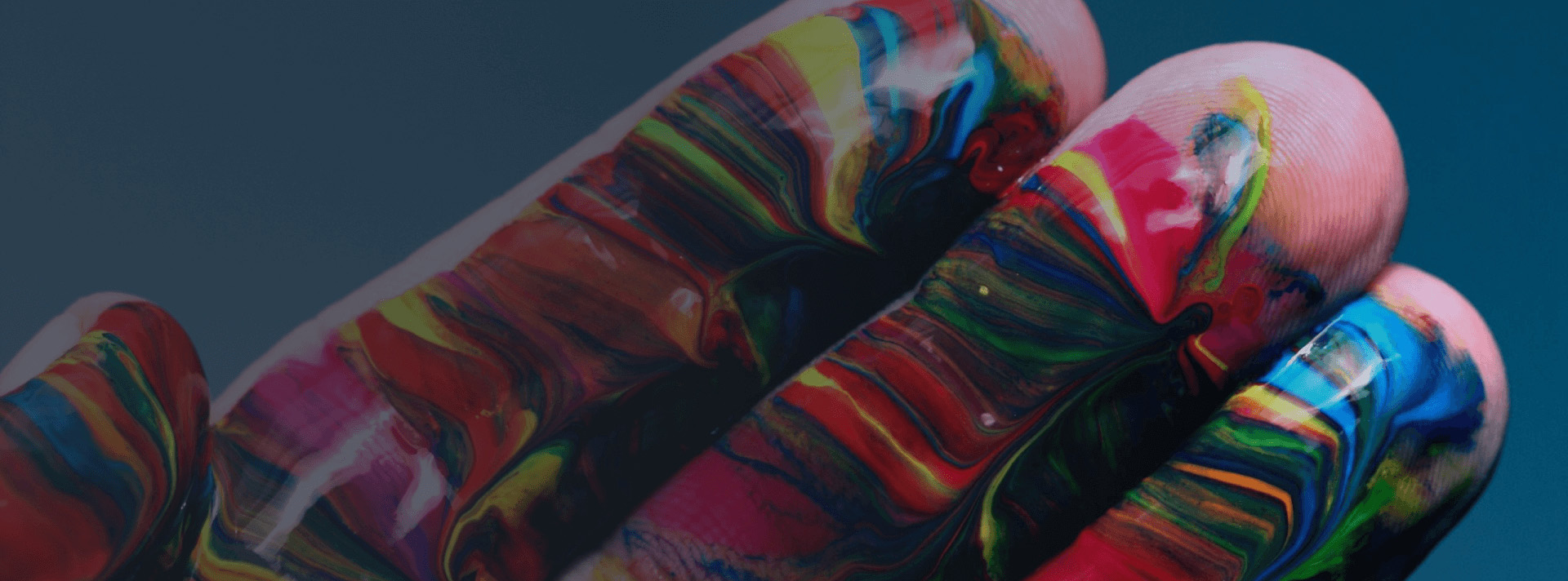 A default banner image of a hand covered in paint.